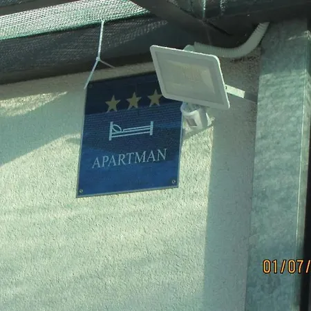 Tomy Apartman *